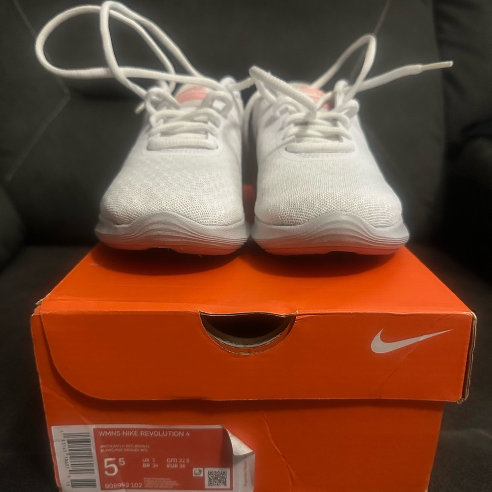 Nike Women’s Revolution 4 White Sneakers